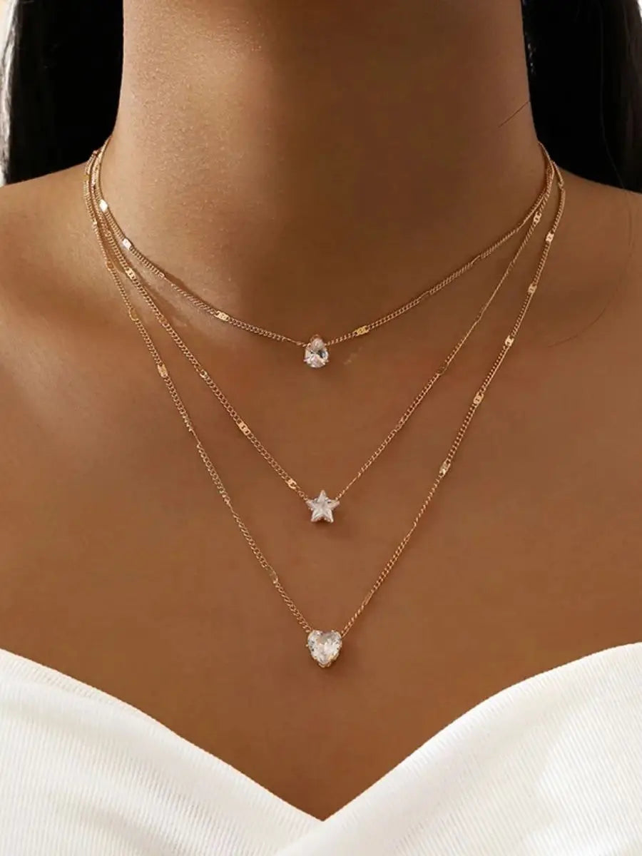 Colar Dourado com Pingentes Estrela, Gota e Coração – Camadas Modernas Femininas