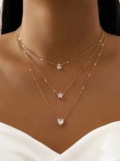 Colar Dourado com Pingentes Estrela, Gota e Coração – Camadas Modernas Femininas