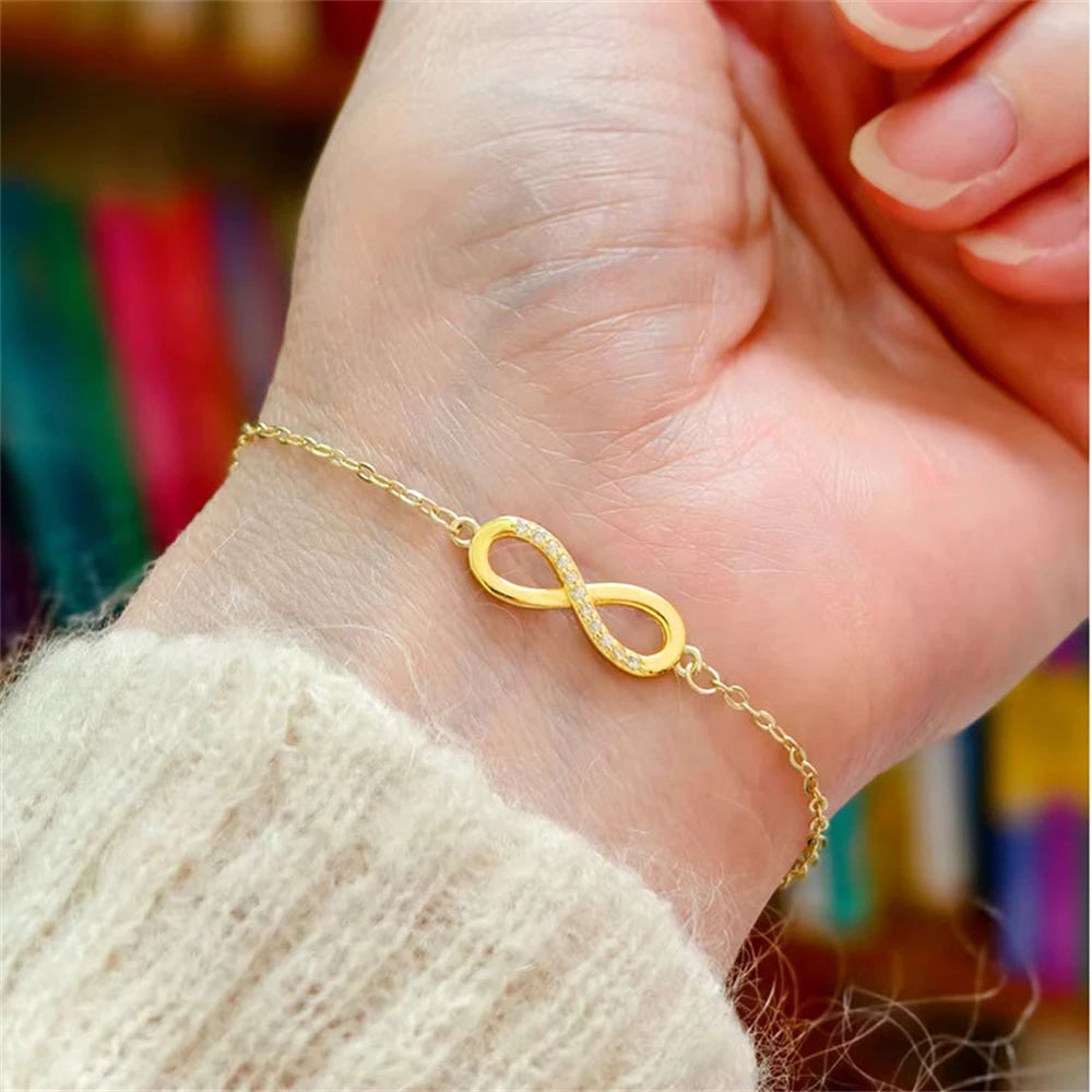 Conjunto Prata 925 Laço Móbio – Colar, Pulseira e Brincos com Cristais Zircônia