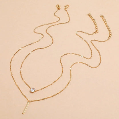 Colar Dourado com Pingentes Estrela, Gota e Coração – Camadas Modernas Femininas