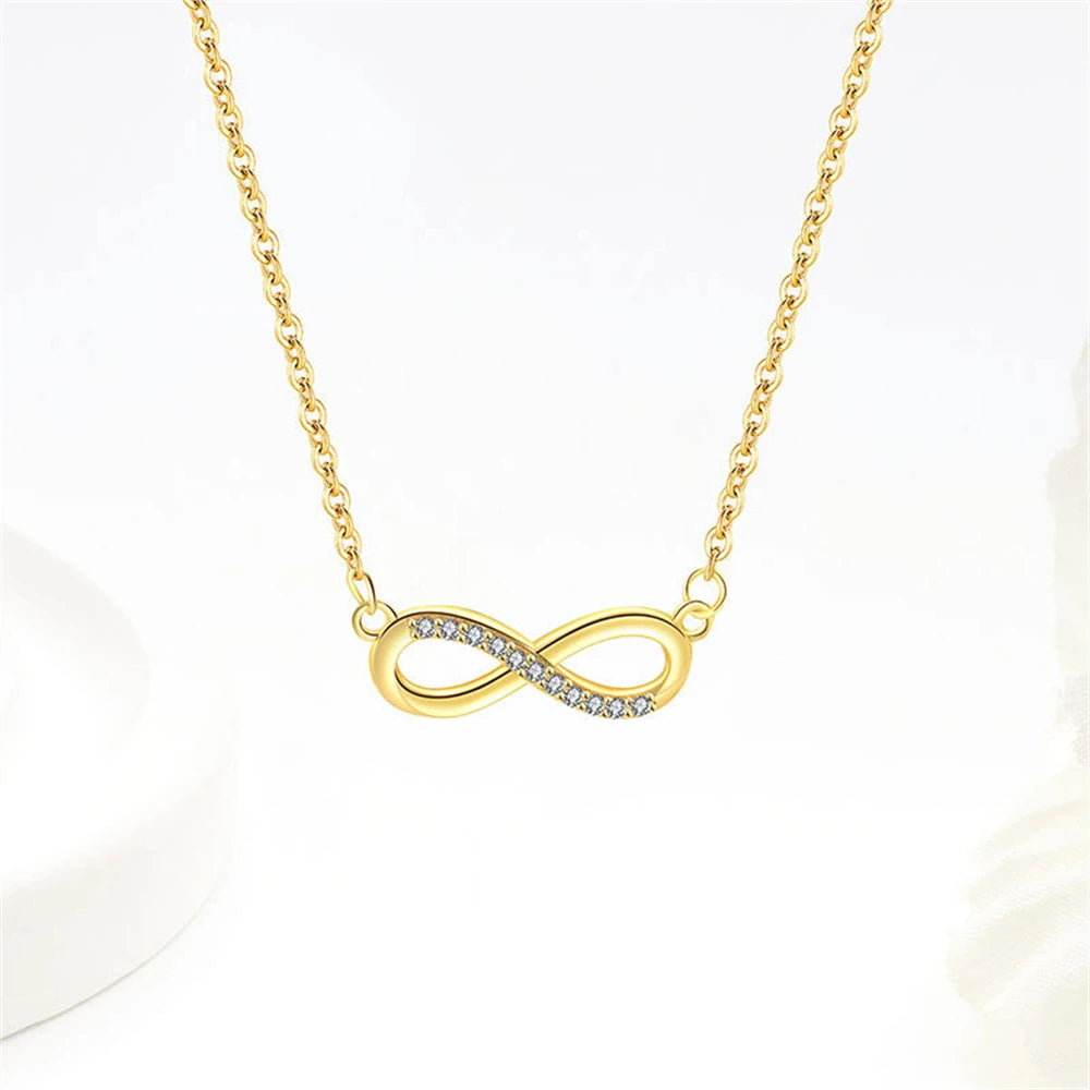 Conjunto Prata 925 Laço Móbio – Colar, Pulseira e Brincos com Cristais Zircônia